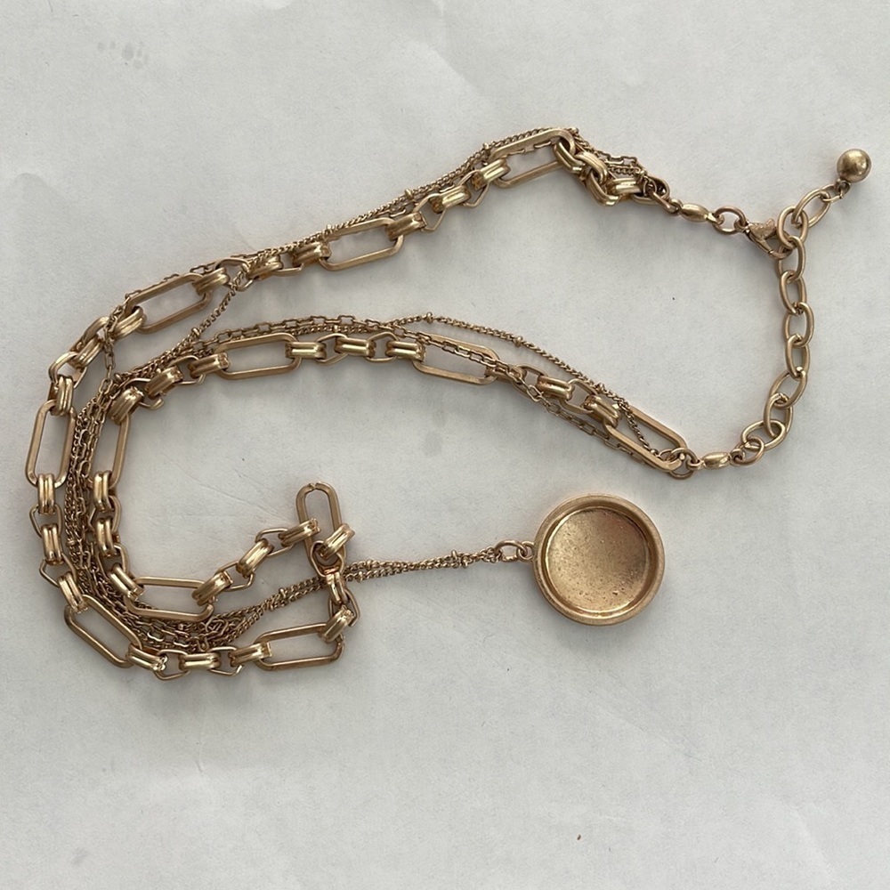 Locket pendant three chain gold necklace